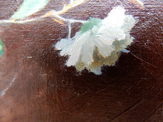 Flower in glass jar.