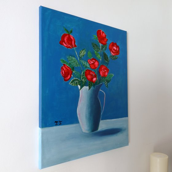 Red Roses in a Blue Vase