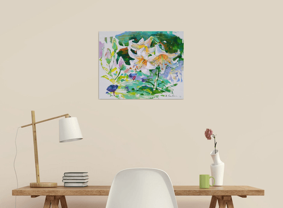 White lilies . Morning garden