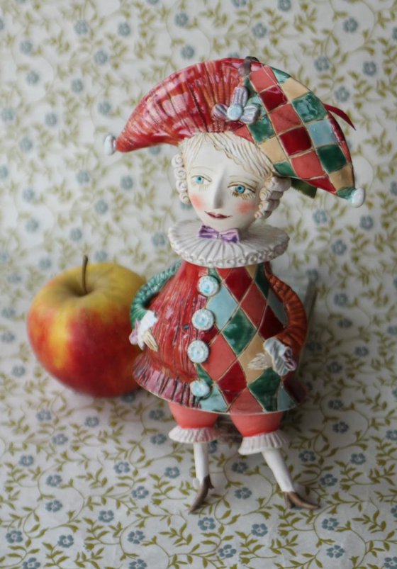 Harlequine. Sculptured bell-doll