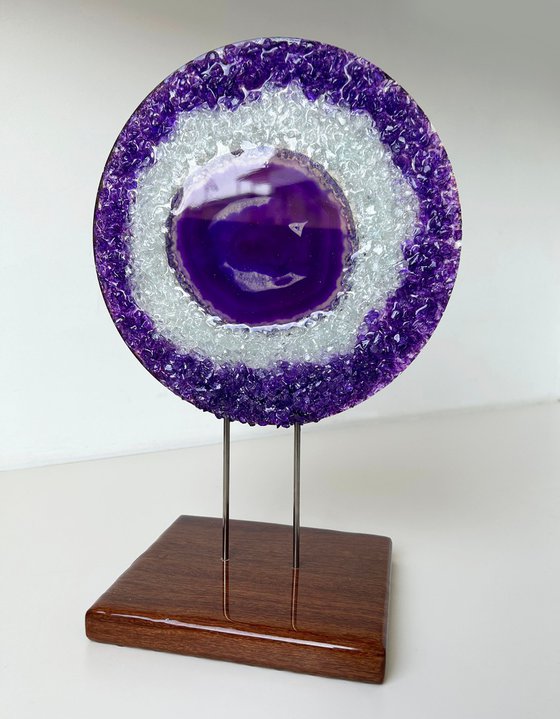 Amethyst framed in a glass circle