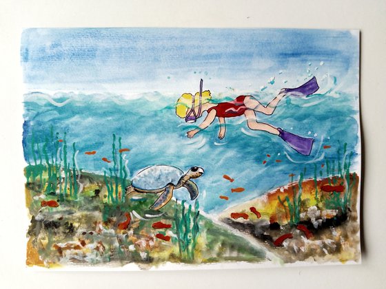 Girl Swimming amongst fishes and a sea turtle