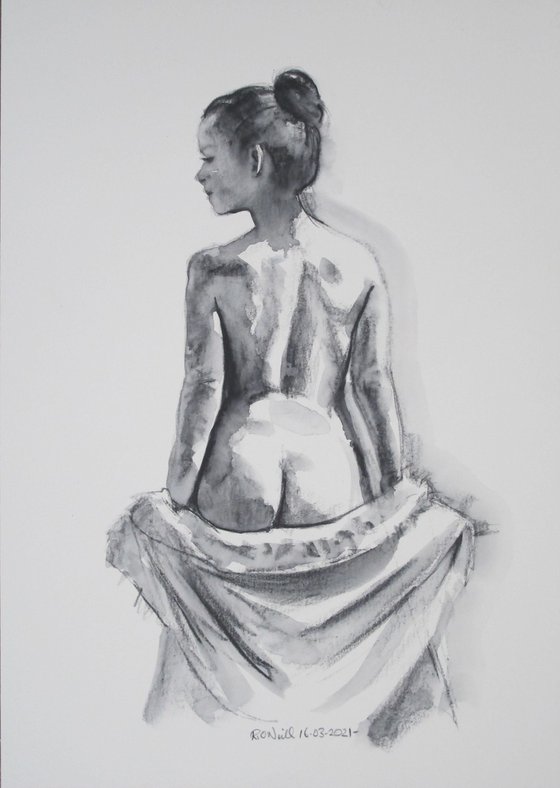 Standing female nude back view