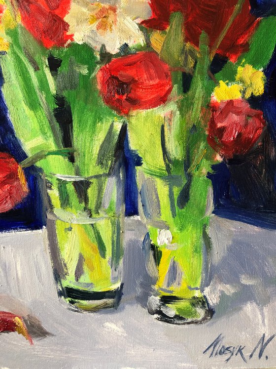 Red Tulips on blue