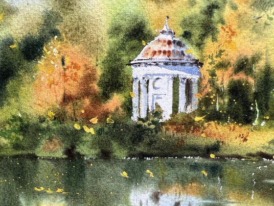 Autumn. Gazebo on the shore of the lake