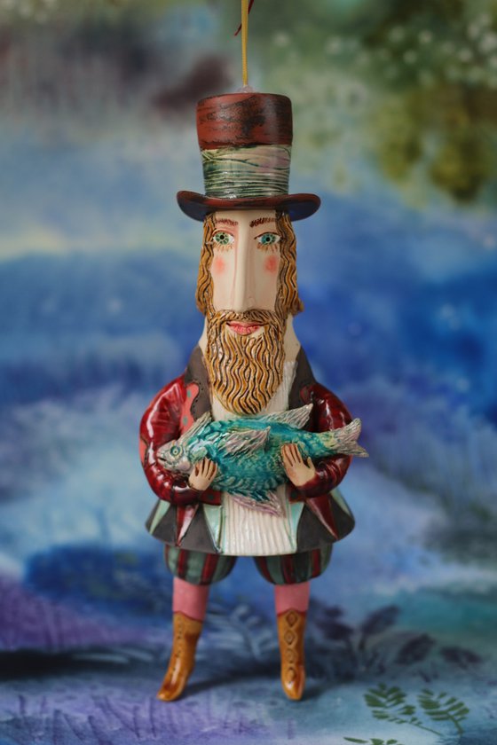 Gentleman holding a fish. Hanging sculpture, Bell-doll