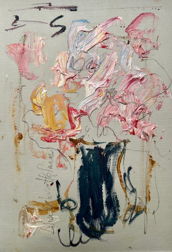 Pink flowers in a blue vase