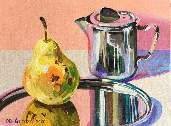 Metallic coffee pot and pear on a silver tray
