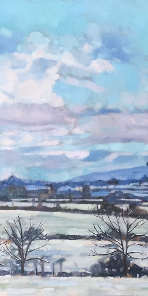 Snowy Skies Over Glastonbury Tor by Emma Dashwood