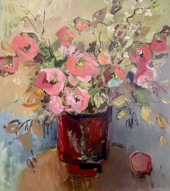 Flowers in a red vase