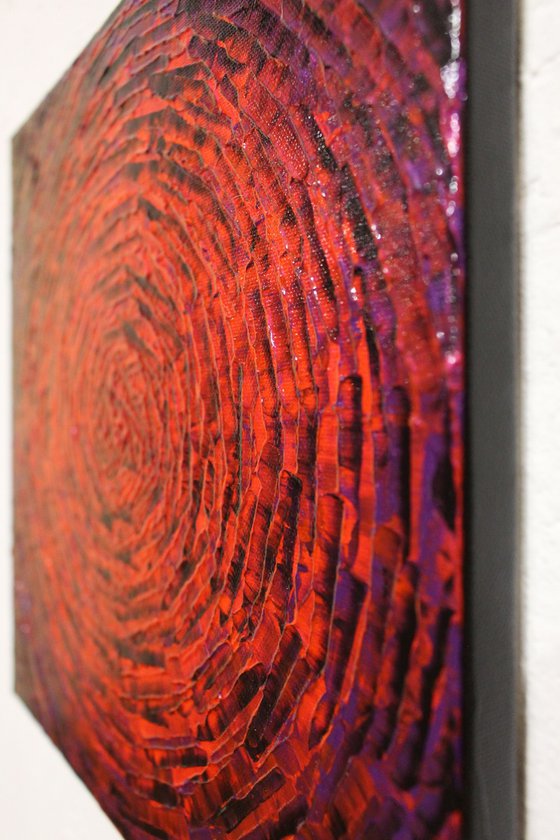 Concentric purplish red burst