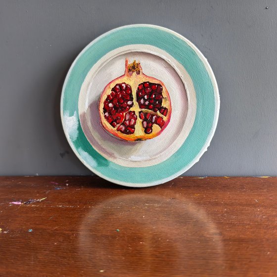 Pomegranate on plate
