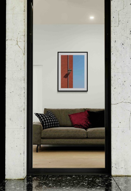 Red wall with a lamp