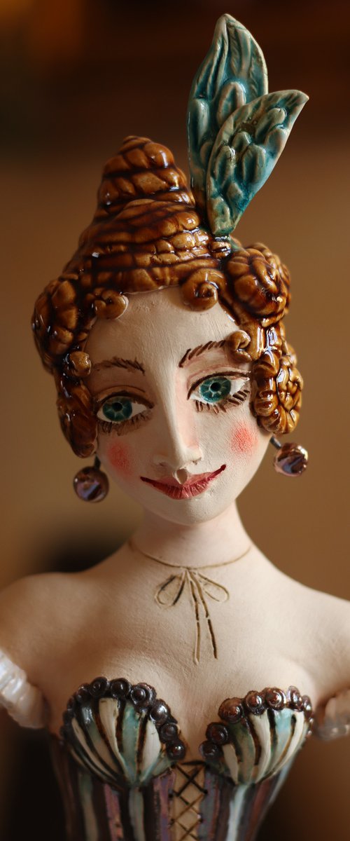 From the Cabaret girls. Girl with a peacock feather in her hair. Wall sculpture by Elya Yalonetski by Elya Yalonetski