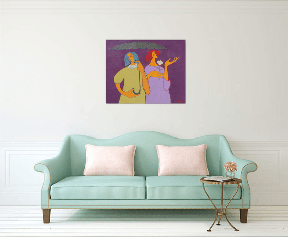 Two under an umbrella.