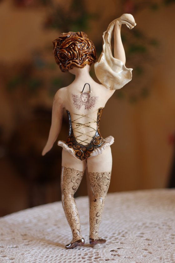 From the Cabaret girls. Girl with a neck tattoo. Wall sculpture by Elya Yalonetski