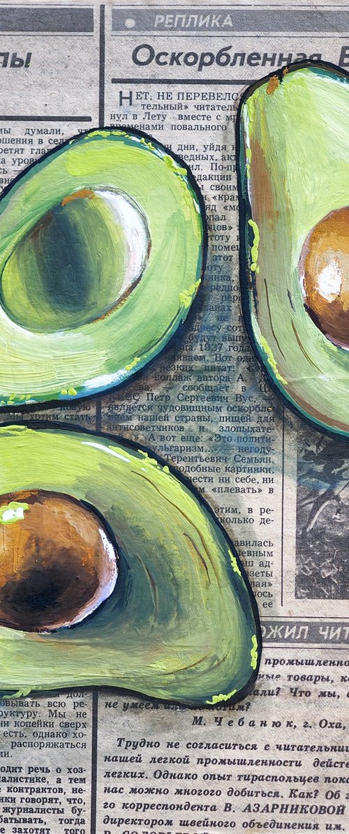 Avocado on vintage (1989) newspaper by Delnara El