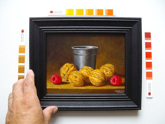 Nuts with a pewter cup