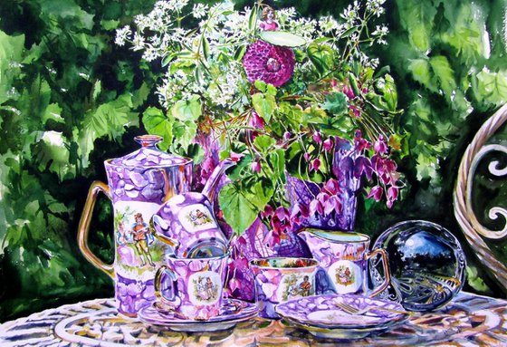 Still life with tea set in the garden