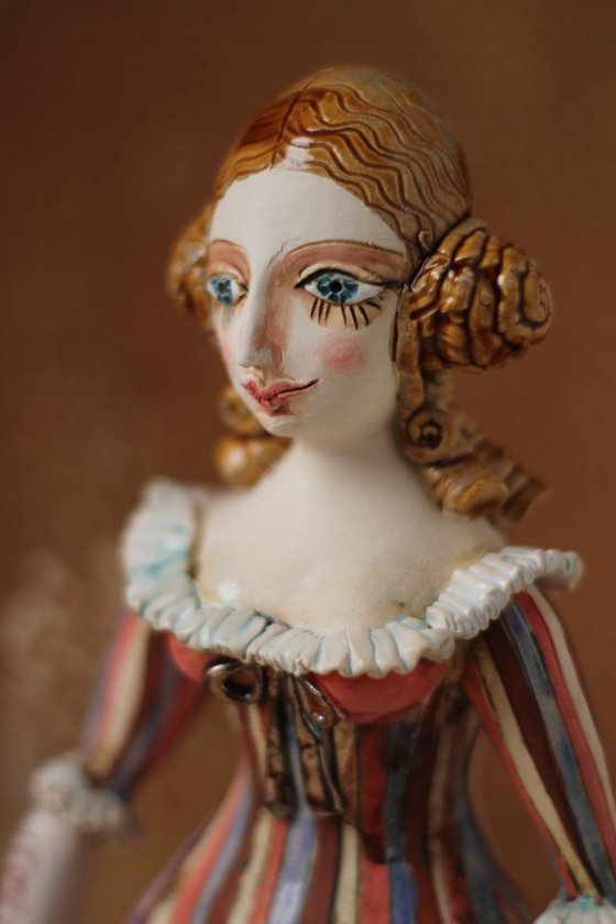 From the Naked clay series, Harlequine Girl. Wall sculpture by Elya Yalonetski