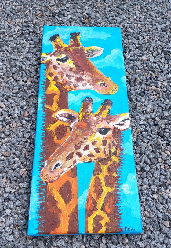 "2 giraffes"