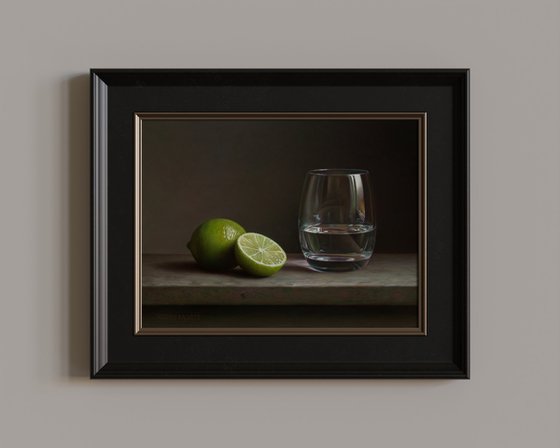 Limes with a glass