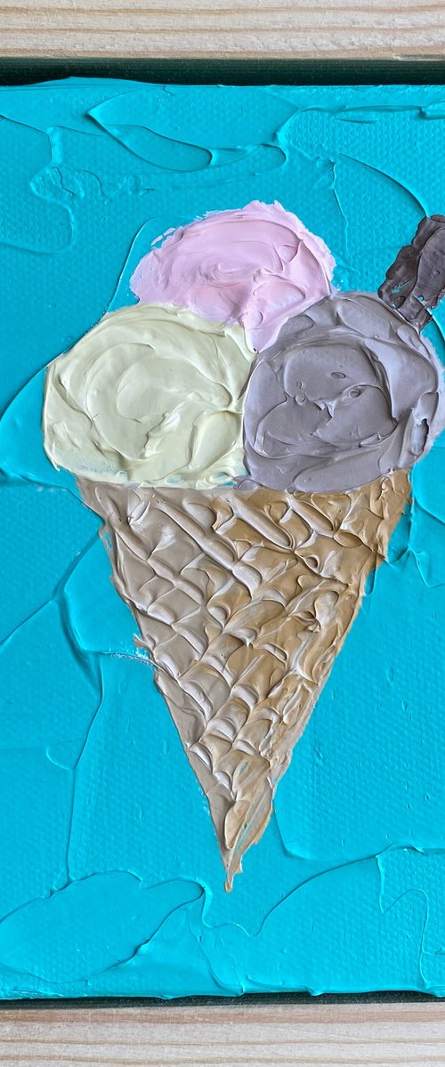 Ice cream on teal (framed) by Guzaliya Xavier