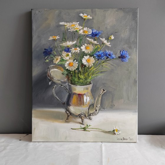 Chamomile and cornflowers bouquet of wild flowers