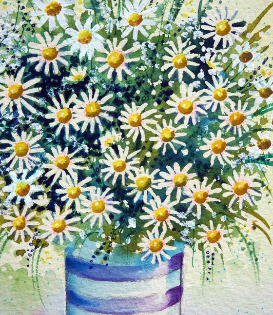 Daisies in a striped pot