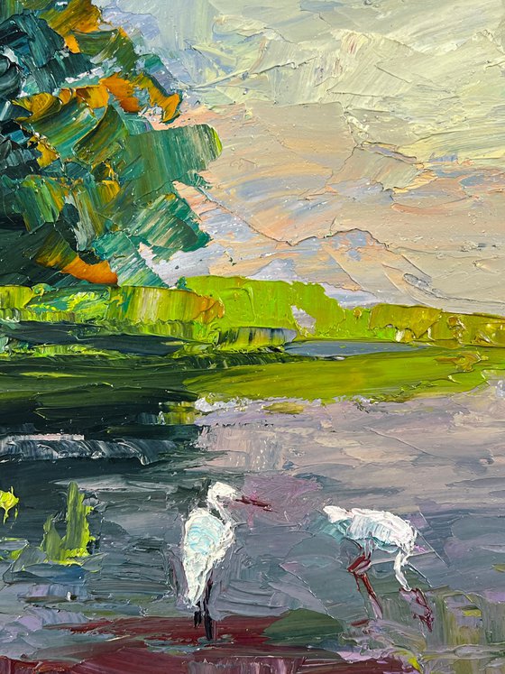 Storks by the Pond