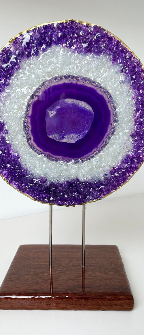 Amethyst framed in a glass circle by Alexandra Dobreikin