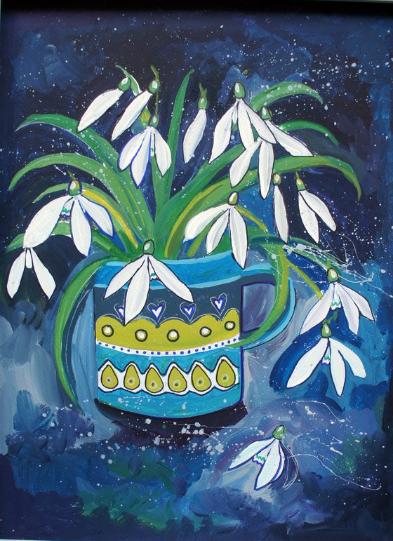 Snowdrops in a patterned cup