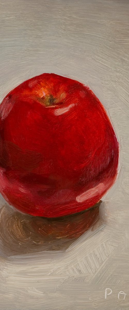 still life of red apple on a white background by Olivier Payeur