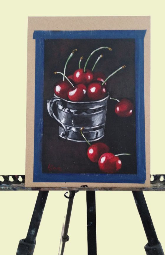 Red cherries on black