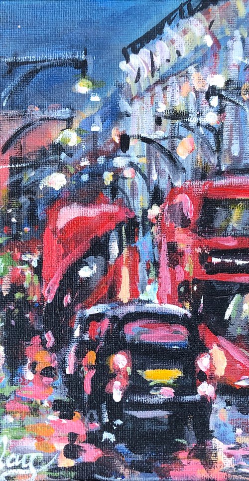 Red buses and taxis, London by Ewen Macaulay