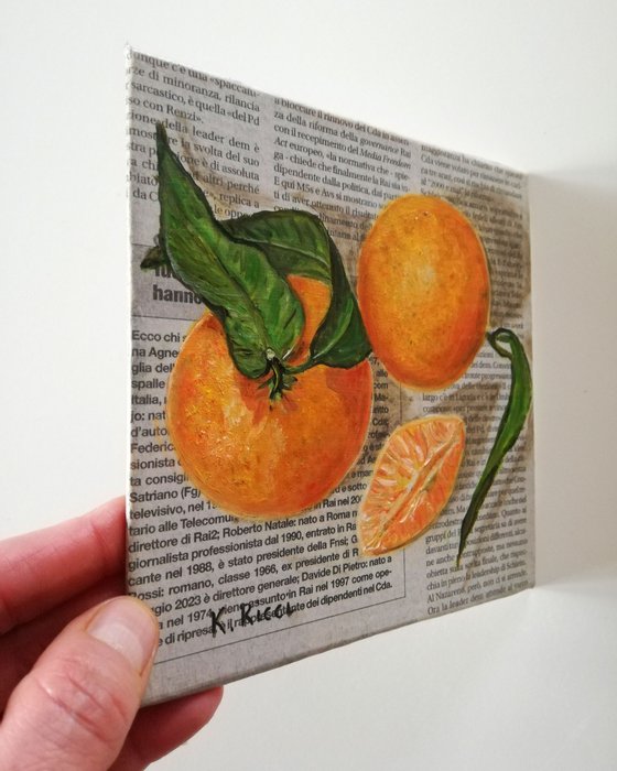 "Tangerines on Newspaper"