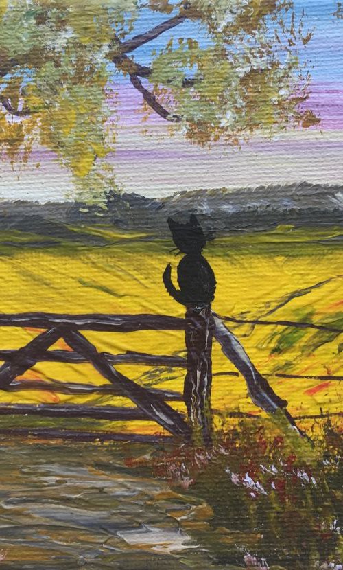 Black cat on the gate on a mini canvas by Marja Brown