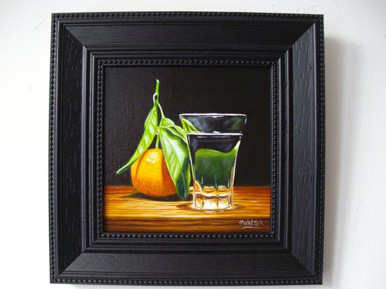 Still life with Clementine and shot glass