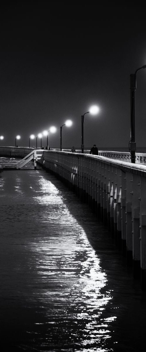 Lonesome walk along the winter pier by Christian  Schwarz