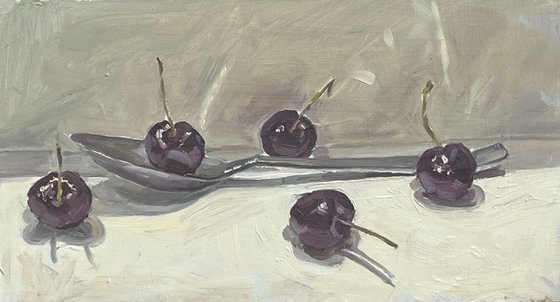 Cherries on a spoon