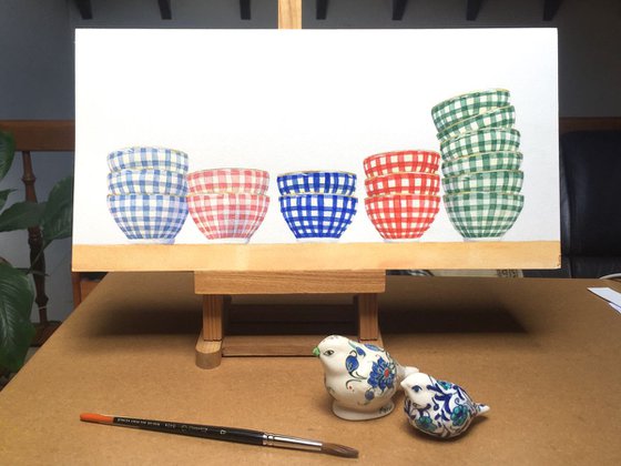 Chequered bowls in a row