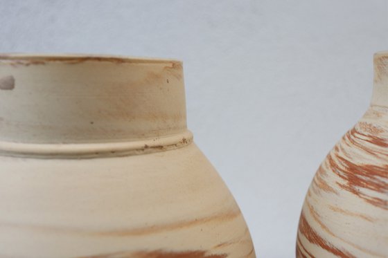 Two mixed clay moon jars