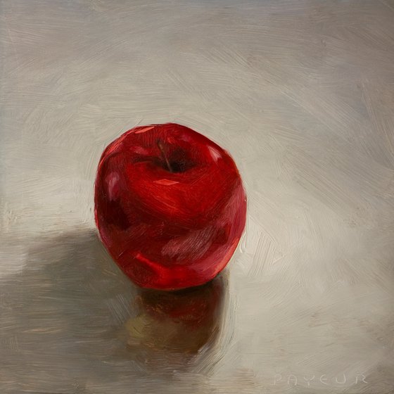 still life of red apple on a white background