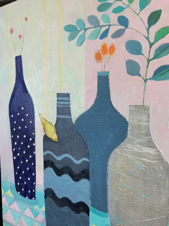 Still life with blue bottles and yellow birds