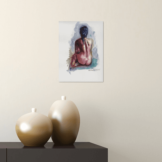 seated female nude back view