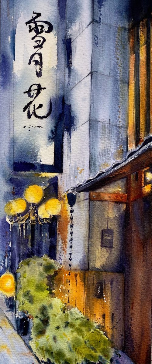 Blurry evening with lights on by Leyla Kamliya