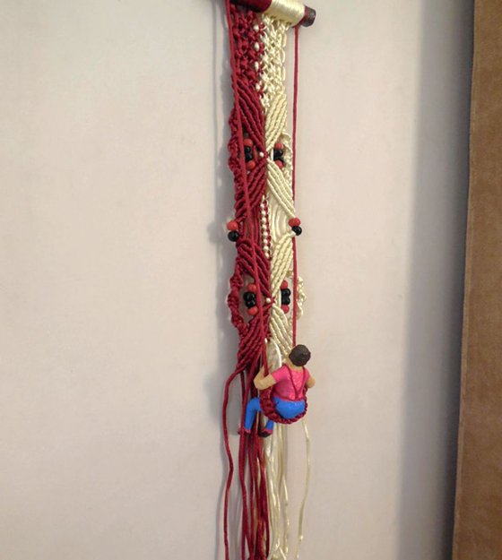 Boy Working on Macrame Wall Hanging