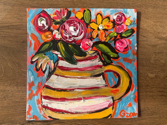 Pot and bright flowers