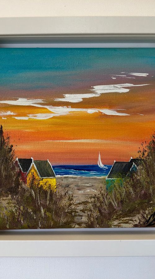Beachuts at Sunset in a White Frame by Marja Brown