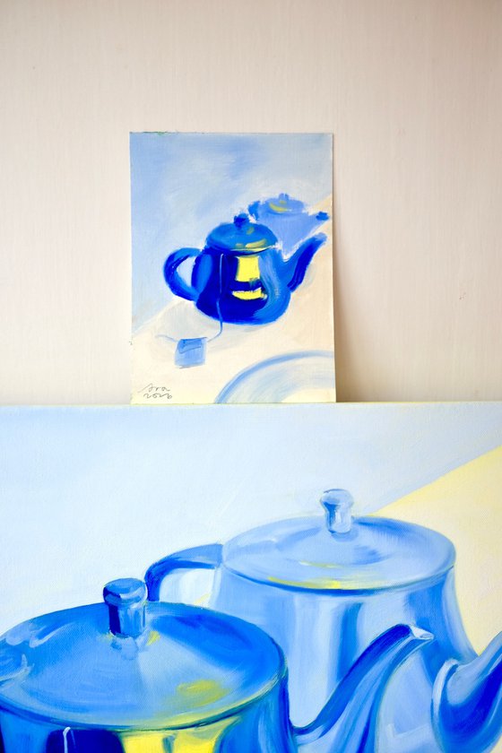 Two Teapots and a Saucer